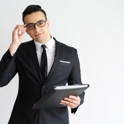 serious-handsome-young-businessman-adjusting-glasses-holding-folder_1262-14365